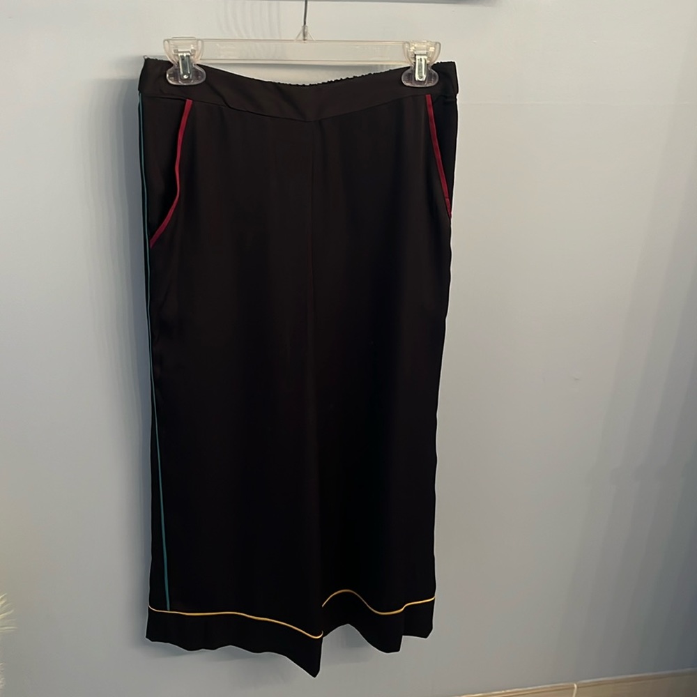 BCBG generation palazzo pants with red green and yellow piping.